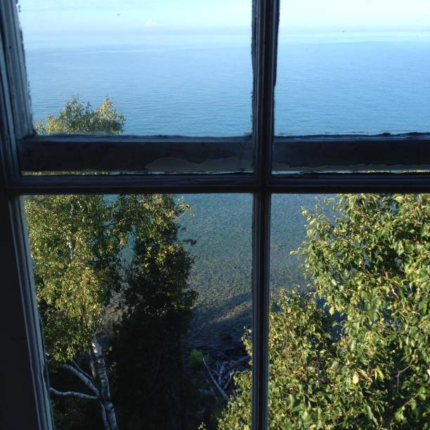 istock Through the Lighthouse window overlooking Georgian Bay 1129059397
