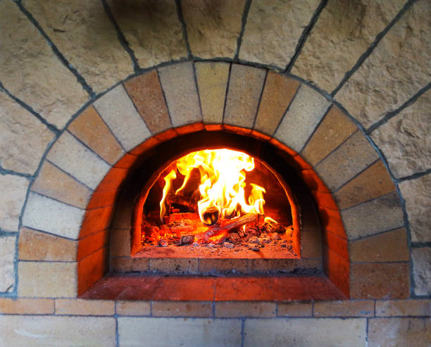 istock Burning firewood in traditional restaurant kitchen 1129062808