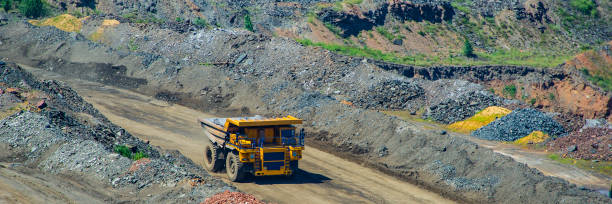 istock board iron ore pit and ore removal by road. 1129065482