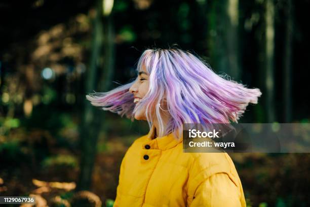 Portrait Of Confident Young Teenage Girl In Nature Stock Photo - Download Image Now