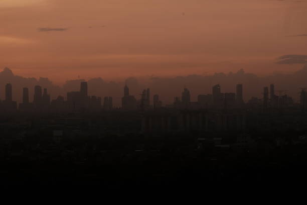 istock Jakarta Skyline At Dawn 1129068212