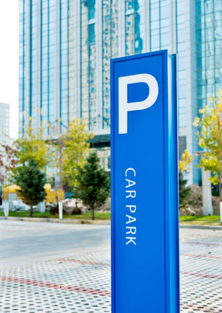 istock A blue parking sign beside the road 1129069746
