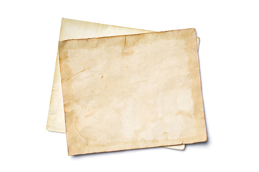 Mockup of empty old vintage yellowed paper sheets isolated on white background