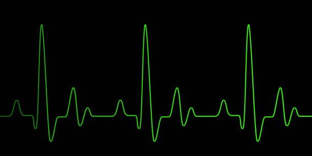 istock Heart pulse graphic green line on black 1129072953