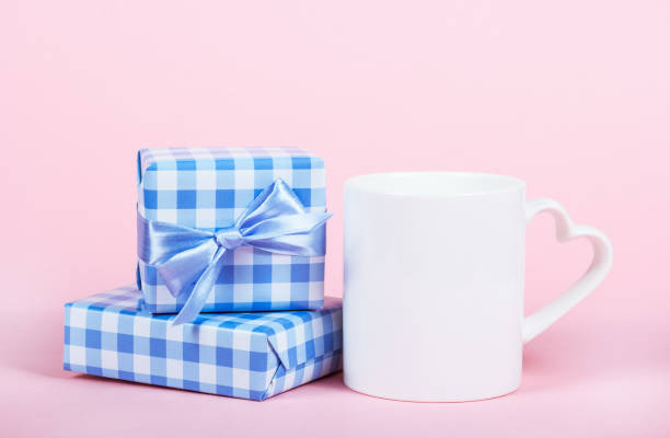 istock Gift boxes and mug. Valentine's day holiday. Cup with heart. 1129076823