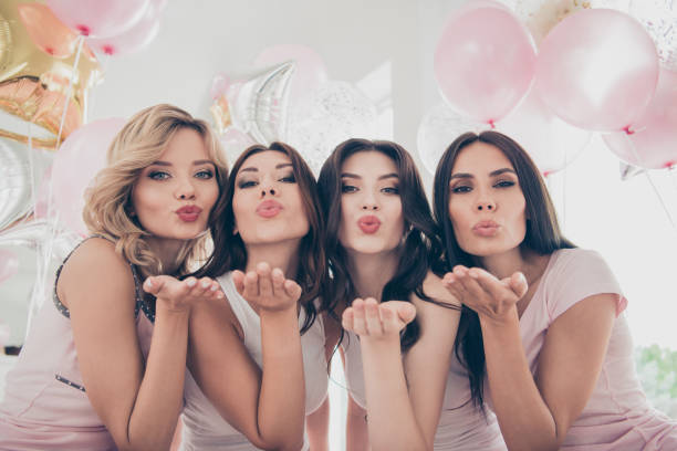 close-up portrait of nice cute lovely lovable winsome fascinating attractive charming cheerful cheery girlfriends sending you kiss having fun in light white interior decorated house indoors - bachelorette party imagens e fotografias de stock