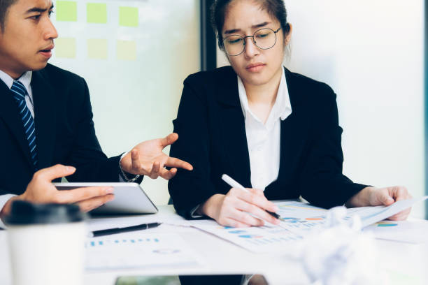 istock Business teamwork blaming partner and serious discussion. 1129081325