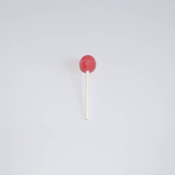 istock Sweet multicolored caramel on a stick. Sweets laid out on the table. 1129083166