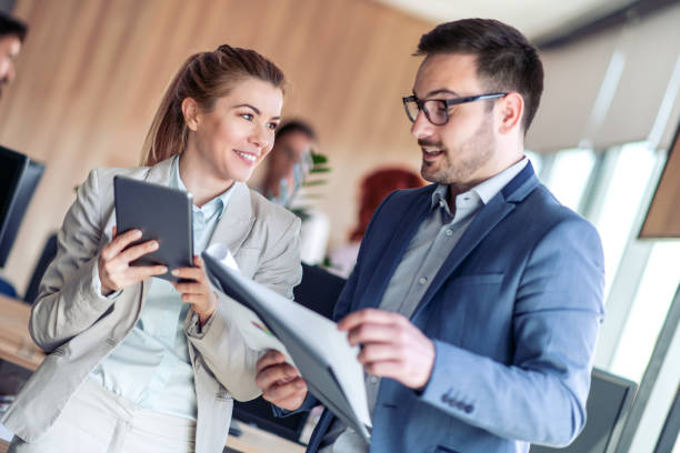 istock Business people working together in office 1129083237