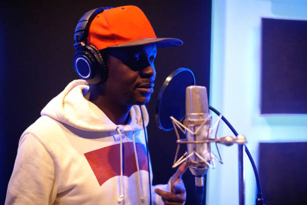 istock Black musician in recording studio 1129084744