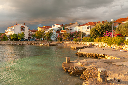 Sunset view of waterfront of quiet Mandre village on Pag island, Croatia