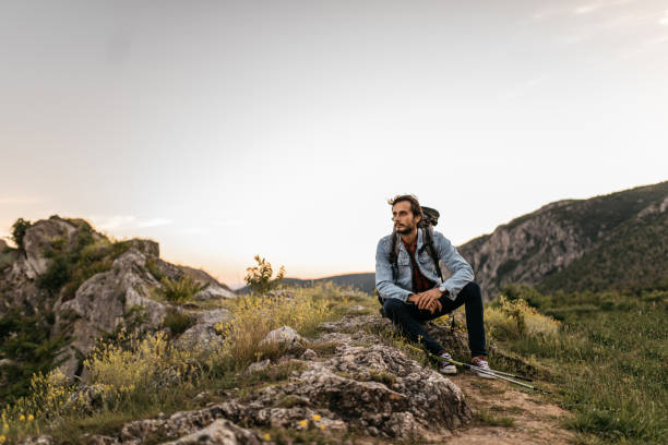 istock Hiker sitting in nature 1129091642