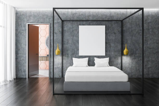 istock Concrete bedroom interior with poster 1129093377