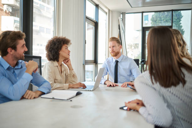 istock Business people having meeting at office. 1129093674