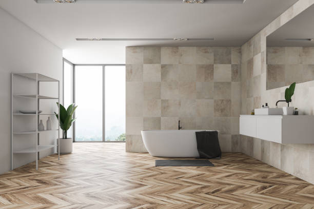 istock Beige tile bathroom, window and shelves 1129093773