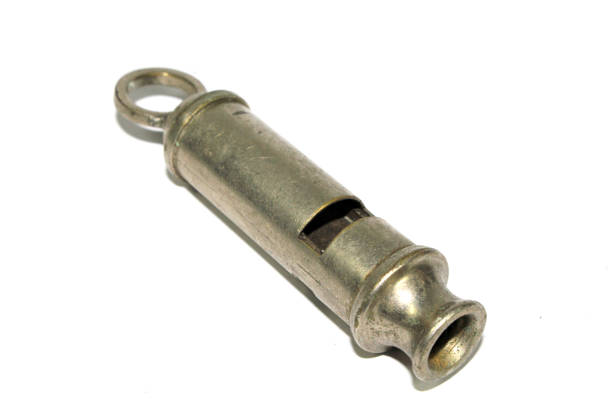 istock Retro Vintage Silver Metal Whistle on White Background 1129093958