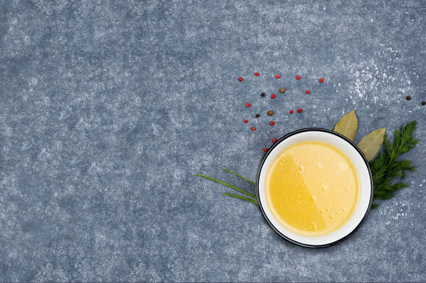 istock Homemade broth in the bowl on the  grey background. 1129094887