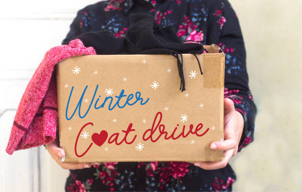 Coat Drive Promotion Coat Drive Promotion winter coat stock pictures, royalty-free photos & images
