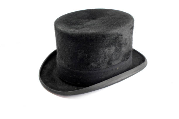 istock Vintage Antique Black Top Hat on White Background 1129096863