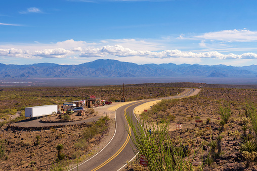 Cool Springs, Arizona, USA - October 24, 2018: Aerial view of the historic route 66 going through the Black Mountains with the rebuilt Cool Springs gas station in Arizona.