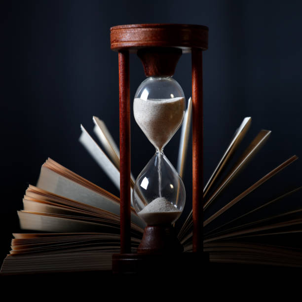 istock Book and an hourglass 1129097788
