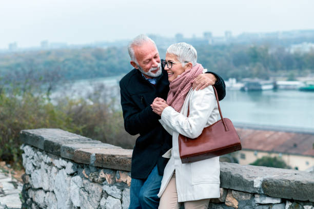 istock Confident Mature Couple Near the River 1129097859