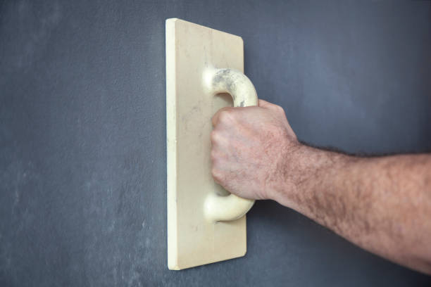istock Smoothing of a Plastered Wall 1129097949