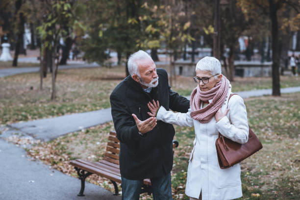 istock Mature Couple Having a Debate in the Public Park 1129098042