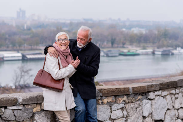 istock Confident Mature Couple Near the River 1129098918