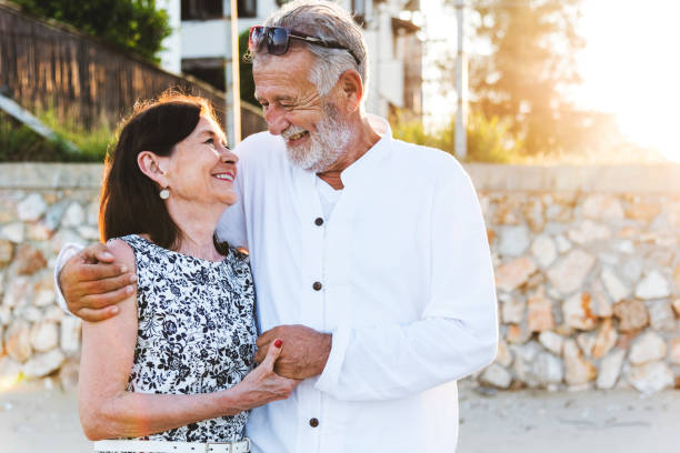istock Mature couple vacationing at a resort 1129100296