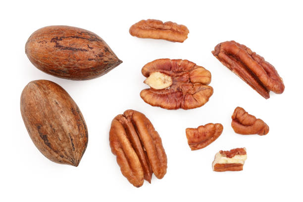 istock pecan nut isolated on white background. Top view. Flat lay 1129101217