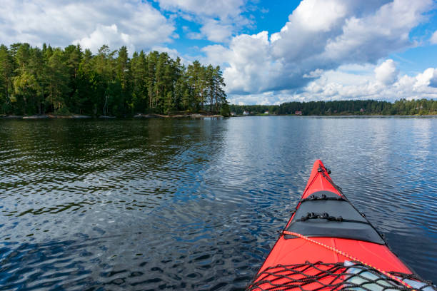 istock Kayaking on a lake in summer in Sweden 1129101668