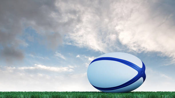 istock Rugby ball put on a well cut lawn 1129101795