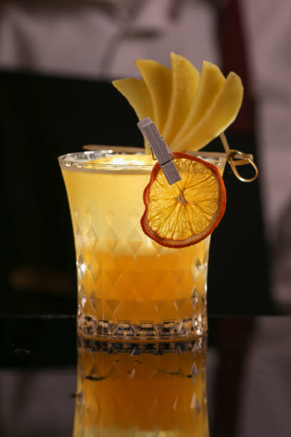 istock Fresh alcohol Penicillin cocktail with orange slice and ice cubes 1129104831