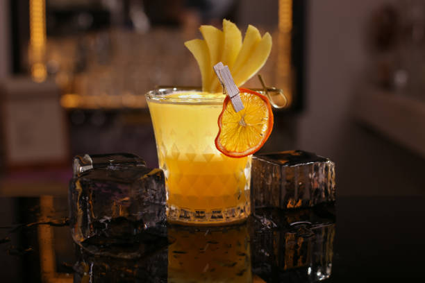 istock Fresh alcohol Penicillin cocktail with orange slice and ice cubes 1129105135