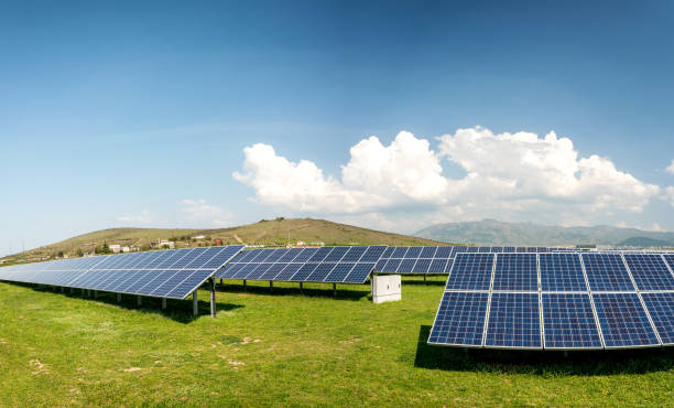 istock Panoramic view of solar panels, photovoltaics, alternative electricity source - concept of sustainable resources 1129106038