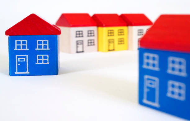 istock wooden model houses 1129111649