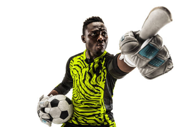 istock One soccer player goalkeeper isolated on white background 1129112104
