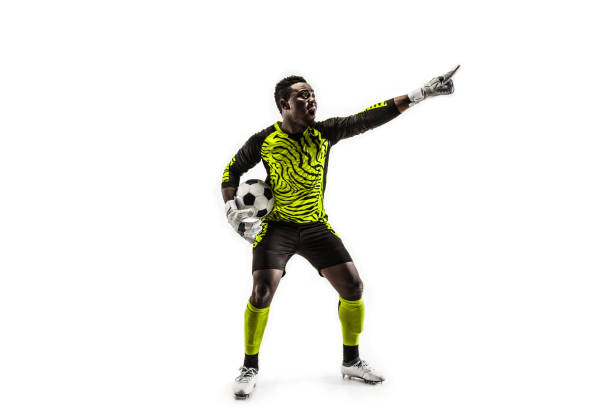 istock One soccer player goalkeeper isolated on white background 1129112109