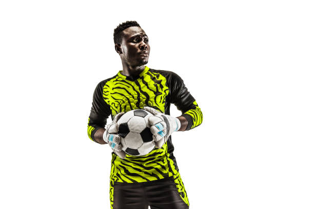 istock one african soccer player goalkeeper 1129112115