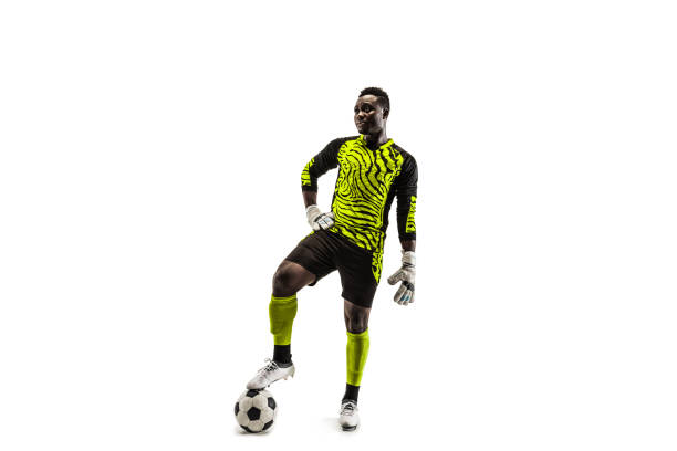 istock one african soccer player goalkeeper 1129112120