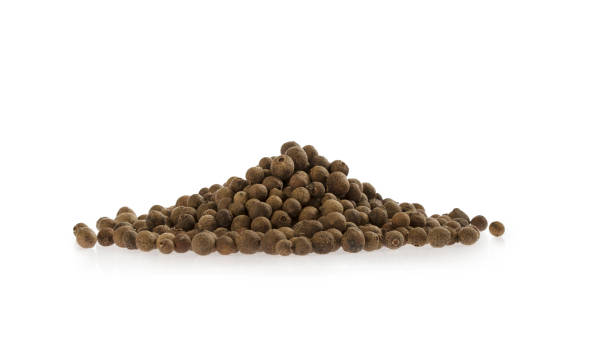 istock Allspice spice pile isolated on white background. 1129115449