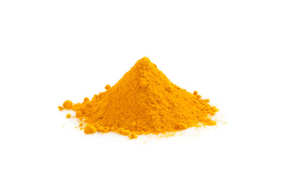istock Turmeric powder pile isolated on white. Curcuma spice. 1129115626