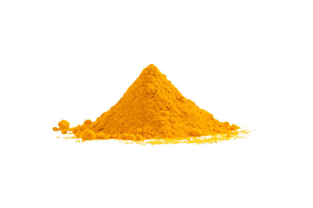 istock Turmeric powder pile isolated on white. Curcuma spice. 1129115633