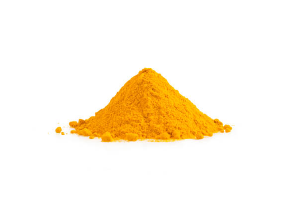 istock Turmeric powder pile isolated on white. Curcuma spice. 1129115634