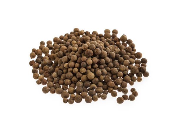 istock Allspice spice pile isolated on white 1129115867