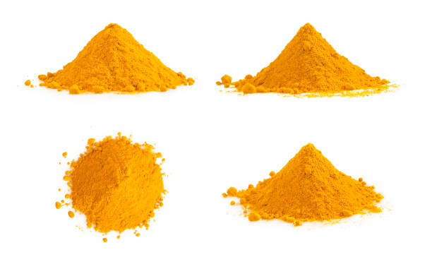 Turmeric powder pile isolated on white. Curcuma spice.