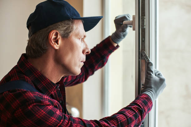 istock Sensitive settings. Close-up of senior handyman setting new windows 1129117437