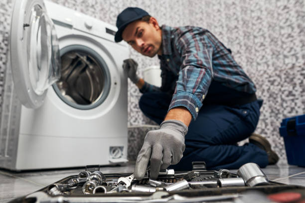 istock Necessary things are always at hand. Working man plumber in bathroom blurred 1129117517