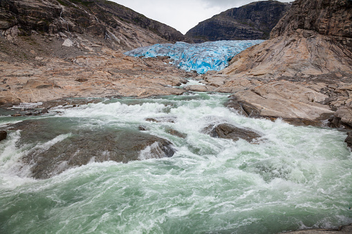 Nigardsbreen Glacier river and terminal face, Jostedalsbreen National Park, Sogn og Fjordane, Norway, Scandinavia. Nigardsbreen is a glacier arm of the large Jostedalsbreen glacier